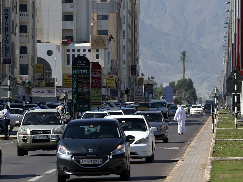 Fujairah ,United Arab Emirates- January, 21, 2015: Pedestrians crossing the road on the Hamad Bin Abdullah street in Fujairah . ( Satish Kumar / The National )  For News / Story by Ruba Haza *** Local Caption ***  SK-Fujairah-22012015-06.jpg