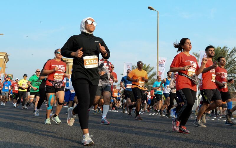 People compete in the sixth edition of the Gulf Bank 642 Marathon in Kuwait City, Kuwait.  EPA