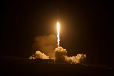 A SpaceX Falcon 9 rocket lifts off from the Vandenberg Air Force Base in California on December 22, 2017 with 10 satellites on board. However, the payload of a launch scheduled for January 5, 2018 has been kept top secret. Matt Hartman via AP