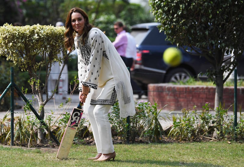 The Duchess of Cambridge plays cricket on a visit to the SOS Village on October 18, 2019, in Lahore, Pakistan. Getty Images