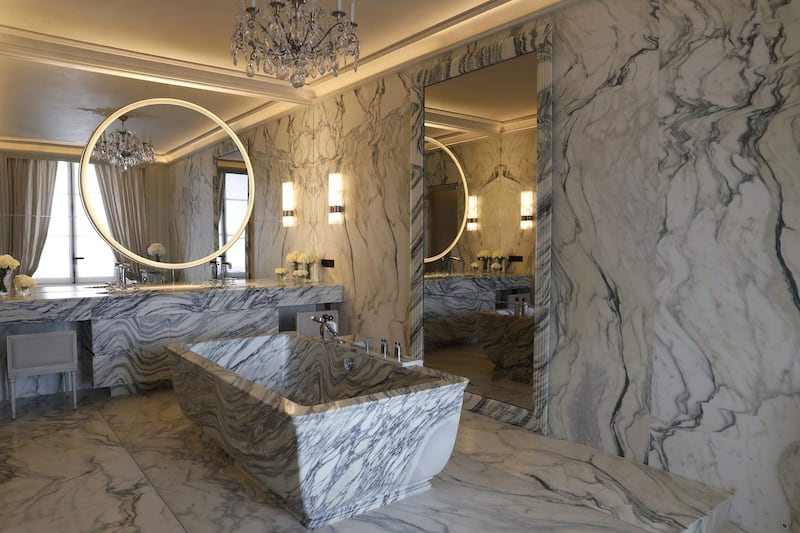A bathroom in one of the suites is done up in white and black marble and has a two-tonne bathtub. Patrick Kovarik / AFP Photo
