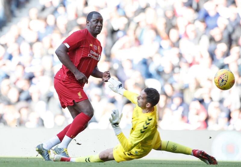 Emile Heskey scores the third goal for the Liverpool legends. Press Association