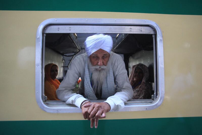 Sikh pilgrims arrive at Wagah border to attend the 180th death anniversary of Sikh ruler Maharaja Ranjit Singh in Lahore, Pakistan. EPA