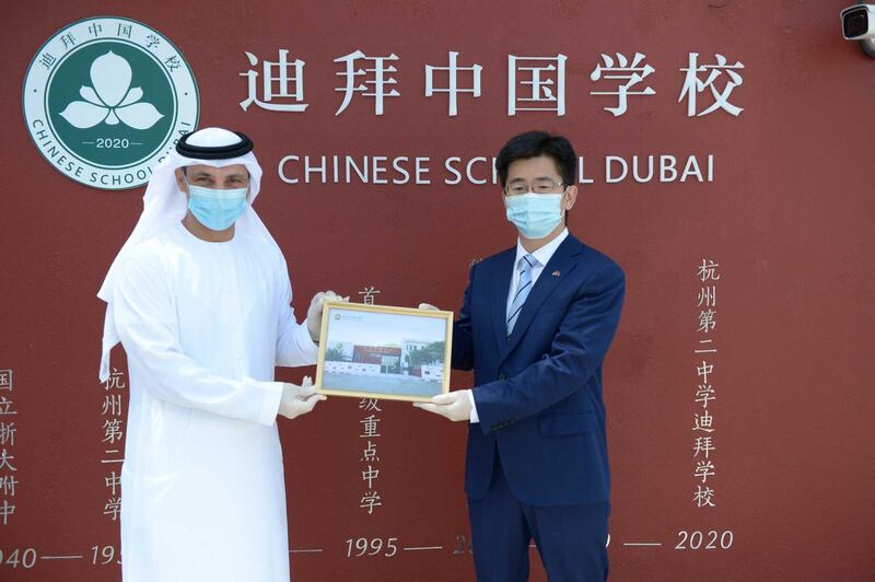 Government of Dubai Media Office – 21 July 2020: The first Chinese national curriculum school to offer full-time K-12 education outside China is set to open in Dubai this September. The Chinese School Dubai, mainly focused on serving the Chinese community in the emirate, will create an additional 2,000 seats in the private education sector once it is fully operational. Photo shows Dr. Abdulla Al Karam, Chairman of the Board of Directors and Director General of the Knowledge and Human Development Authority (KHDA) with Li Xuhang, Consul General, Consulate-General of The People’s Republic of China in Dubai. Courtesy Dubai Media Office