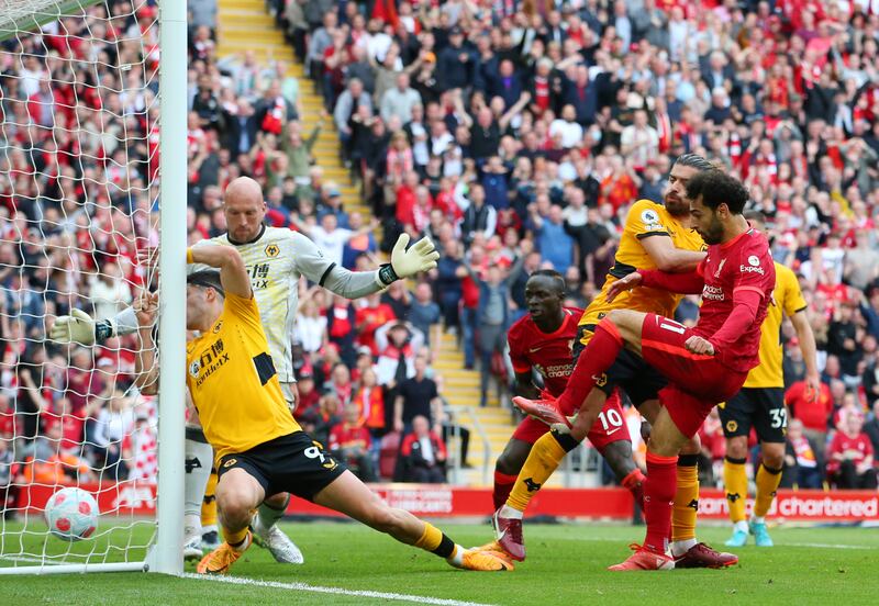 Mohamed Salah scores Liverpool's second goal against Wolves. Getty