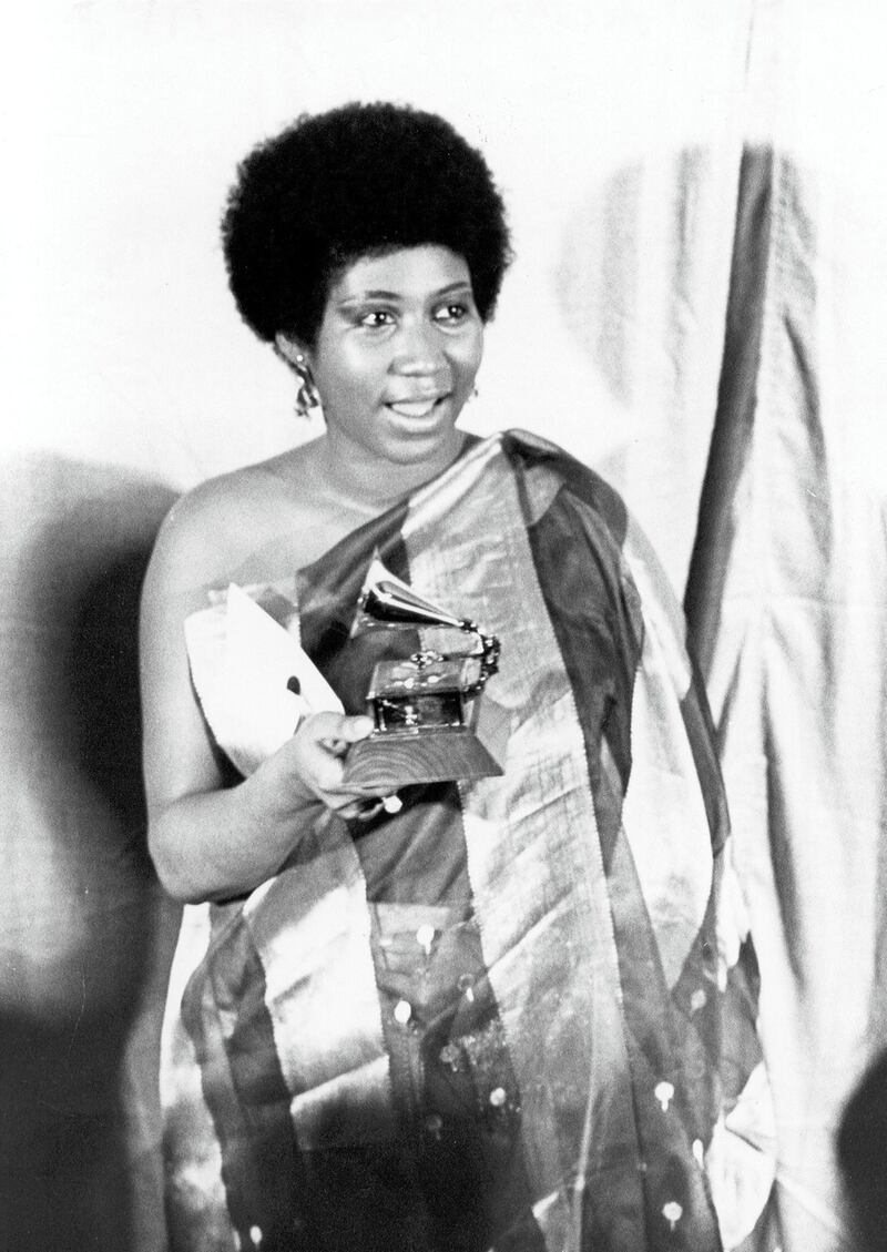 CIRCA 1971:  Soul singer Aretha Franklin holds the Grammy award that she won in circa 1971. (Photo by Michael Ochs Archives/Getty Images)