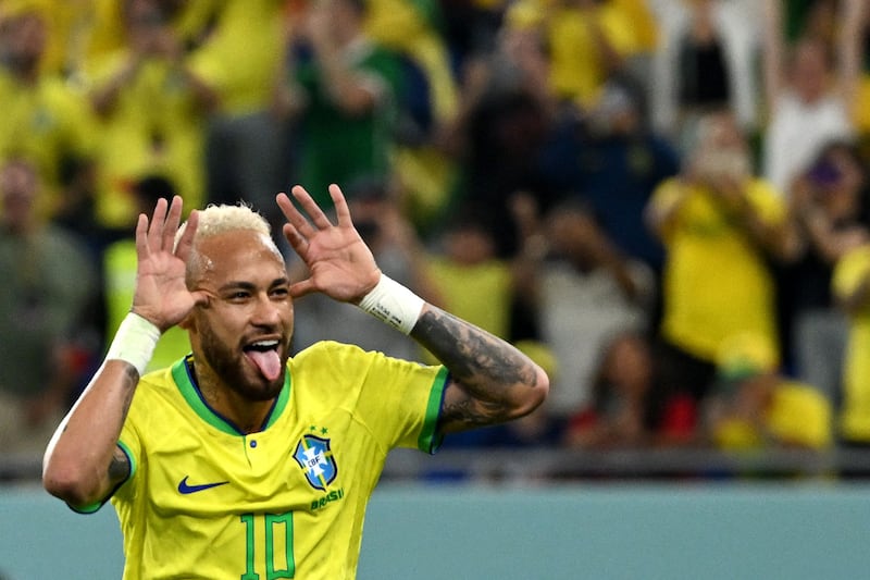 Brazil's Neymar celebrates scoring his team's second goal. AFP