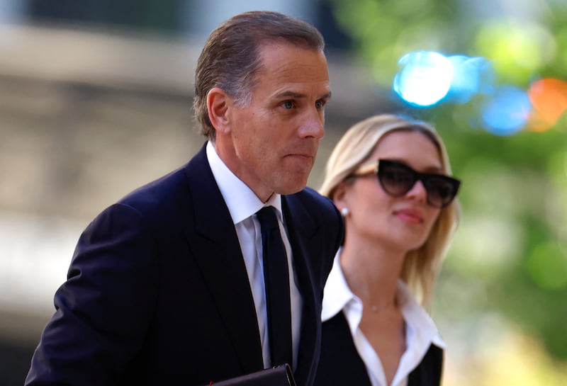 Hunter Biden and his wife, Melissa Cohen Biden, arrive at the J Caleb Boggs Federal Building in Wilmington, Delaware. Getty Images / AFP