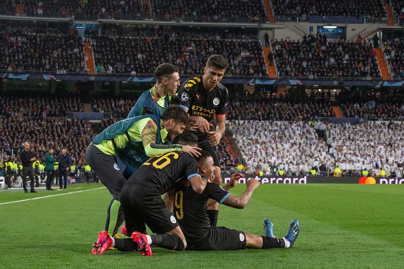 City players celebrate after Jesus levels the scores against Real Madrid in February. City won the match 2-1. EPA