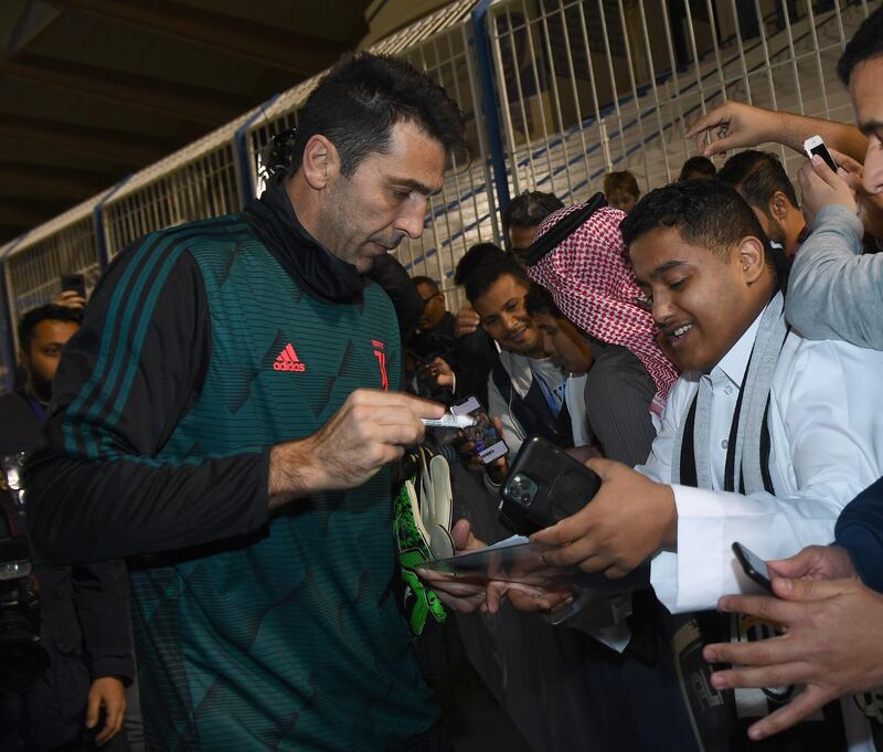 Gianluigi Buffon of Juventus signing autographs. Getty