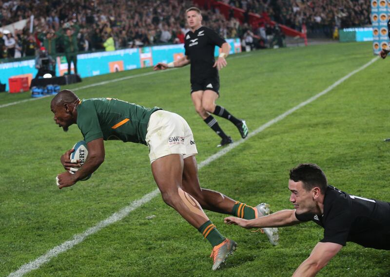 South Africa's Makazole Mampimpi scores his side's second try. EPA