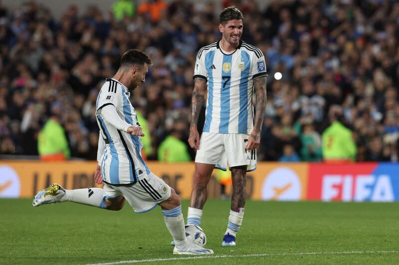 Argentina forward Lionel Messi shoots a free kick that hits the Paraguay post. AFP