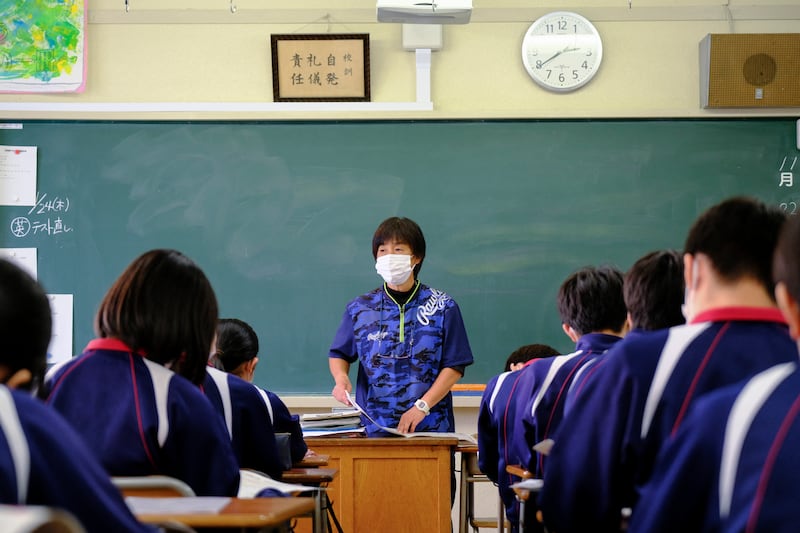 A lesson at a middle school in Tokyo, Japan. AFP