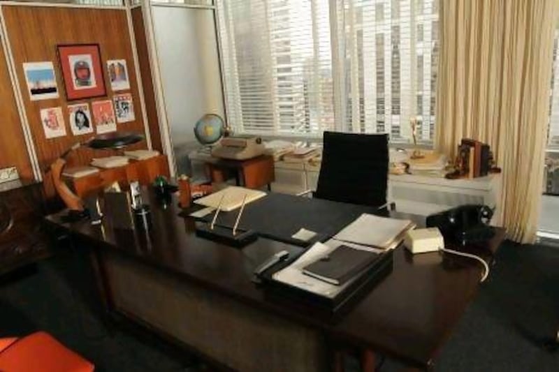 The brass, teak and leather used in the Mad Men television show's office sets 
help create an understated yet powerful vibe. Michael Yarish / AMC