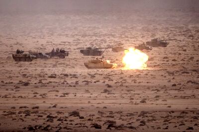 An M1 Abrams tank fires a round during an exercise in the Tan-Tan region of south-west Morocco. AFP