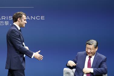 French President Emmanuel Macron and Chinese President Xi Jinping during a Franco-Chinese Business Council meeting in Paris on Monday. EPA