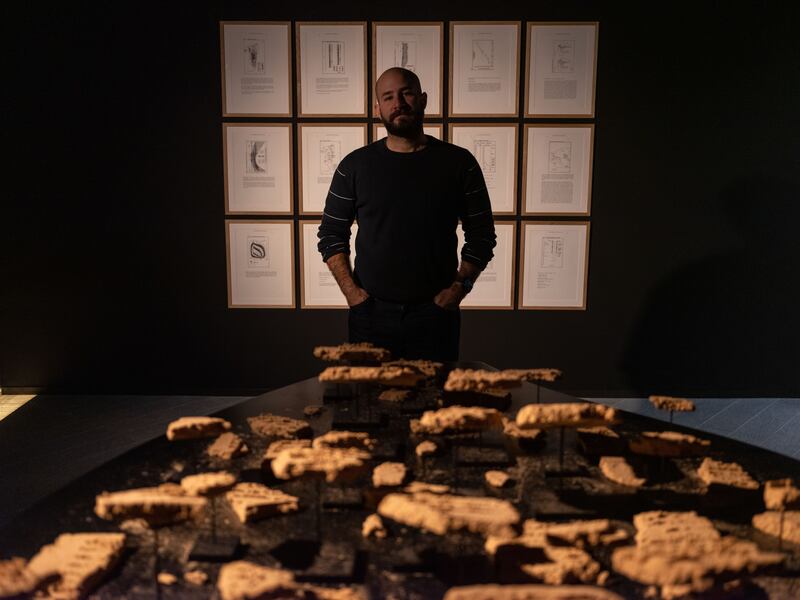 Nasser Alzayani with his installation 'Watering the distant, deserting the near'. Photo: Augustine Paredes / Seeing Things