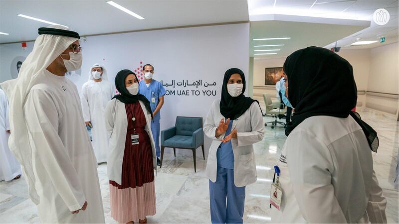 Sheikh Khalid bin Mohamed, member of the Executive Council and chairman of Abu Dhabi Executive Office, visits Sheikh Khalifa Medical City on the first day of a Covid-19 vaccination programme for medical staff. Courtesy: Abu Dhabi Government Media Office