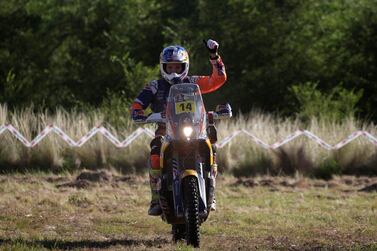 Sam Sunderland of Britain celebrates after finishing the special stage riding his KTM at Saturday's Dakar Rally from Rio Cuarto to Buenos Aires, Argentina. Ricardo Moraes / Reuters