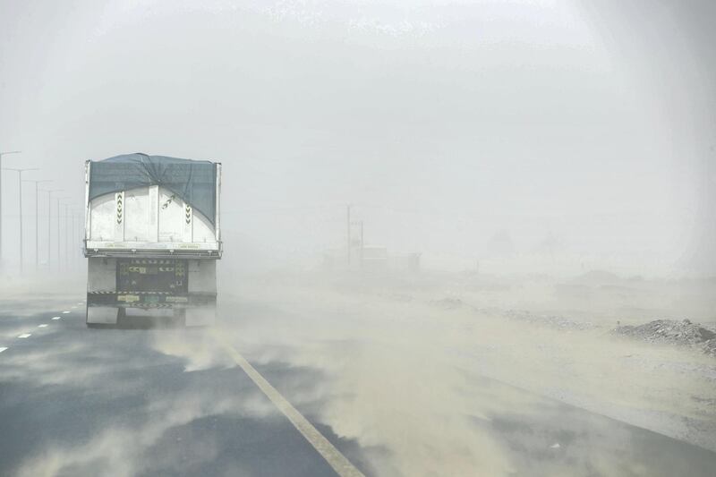 RAS AL KHAIMAH, UNITED ARAB EMIRATES. 09 AUGUST 2018. Extreme winds created sand storm conditions in the Emirates. Low visibility forced drivers to take extra caution while commuting. (Photo: Antonie Robertson/The National) Journalist: None. Section: National.