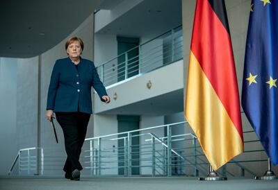 FILE PHOTO: German Chancellor Angela Merkel arrives for a media statement on the spread of the new coronavirus disease (COVID-19) at the Chancellery in Berlin, Germany, March 22, 2020.   Michel Kappeler/Pool via REUTERS/File Photo