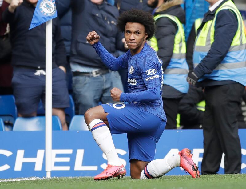 Chelsea's Willian celebrates after scoring his side's third goal. AP