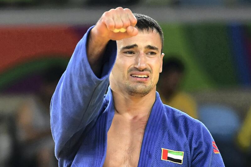 United Arab Emirates's Sergiu Toma celebrates after defeating Italy's Matteo Marconcini during their men's -81kg judo contest bronze medal A match of the Rio 2016 Olympic Games in Rio de Janeiro on August 9, 2016. / AFP PHOTO / Toshifumi KITAMURA