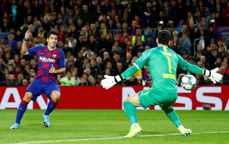 Barcelona's Luis Suarez scores the opening goal. EPA