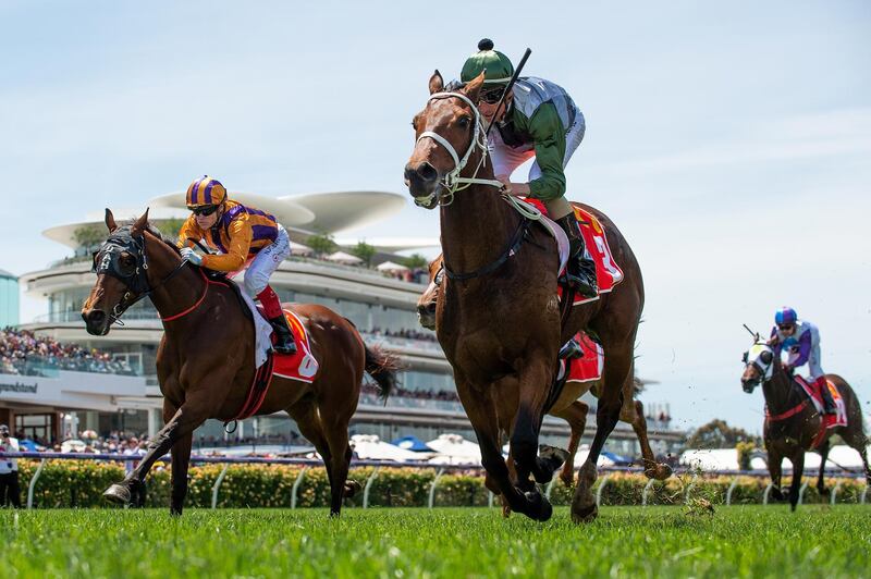 Nash Rawiller rides Shared Ambition to victory in The Macca's Run. EPA