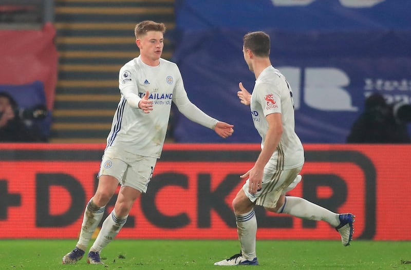 Leicester City's Harvey Barnes, left, after scoring against Crystal Palace on Monday. EPA