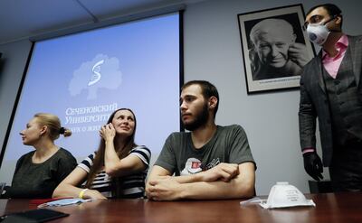 epa08546984 Volunteers on whom the Russian vaccine against COVID-19  was tested on, sit at the table during a news conference at the Science and Practice Center for Interventional Cardioangiology in Moscow, Russia, 15 July 2020, after ending the first stage of clinical trials of vaccine form against COVID-19.  Lyophilized (freeze-dried) in powder form to prepare solutions for intramuscular injections, the vaccine was developed at the Gamaleya Research Institute of Epidemiology and Microbiology. A group of 38 volunteers have been involved in the first stage of clinical trials at the Sechenov University on the basis of the Science and Practice Center for Interventional Cardioangiology. The first 18 volunteers who received injections on 18 June, have been discharged on July 15, the others who received injections on 23 June will be discharged on July 20. Outpatient observation will continue for the study participants.  EPA/YURI KOCHETKOV