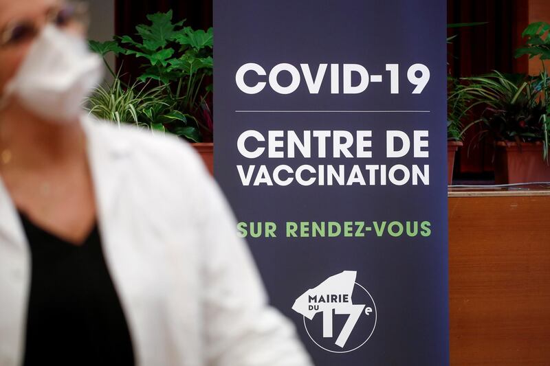 An informational sign is seen at Paris 17th district city hall as part of the coronavirus disease (COVID-19) vaccination campaign, in Paris, France, March 16, 2021. REUTERS/Benoit Tessier