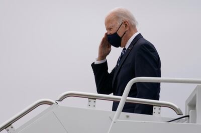 President Joe Biden pauses to salute as he boards Air Force One at Andrews Air Force Base, Md., Tuesday, March 16, 2021, en route to Philadelphia International Airport in Philadelphia. (AP Photo/Carolyn Kaster)
