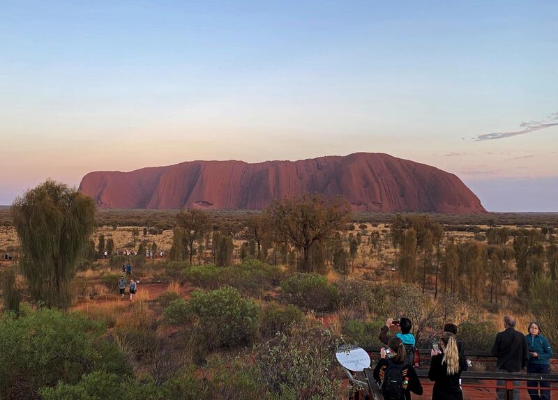 People view Uluru, formerly known as Ayers Rock, near Yulara, Australia. Reuters