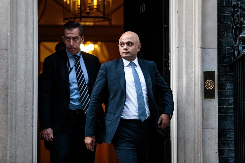 LONDON, ENGLAND - OCTOBER 24: Home Secretary Sajid Javid (R) leaves Number 10 Downing Street on October 24, 2018 in London, England. British Prime Minister Theresa May is expected to discuss the ongoing Brexit negotiations later as she faces MPs in the Conservative party's influential 1922 Committee. (Photo by Jack Taylor/Getty Images)