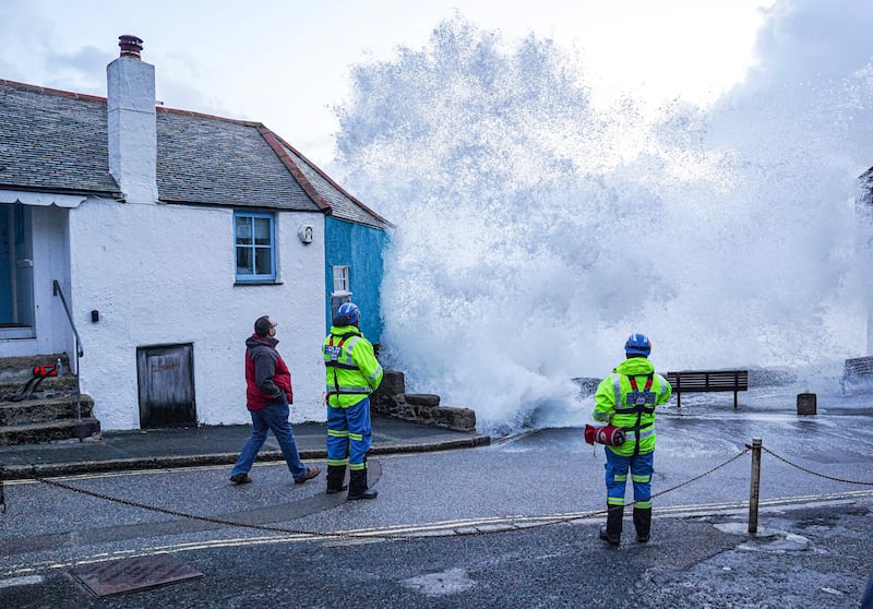 Waves crash over the harbour wall in St Ives, Cornwall, as Storm Kathleen hits the southern UK coast. Getty Images