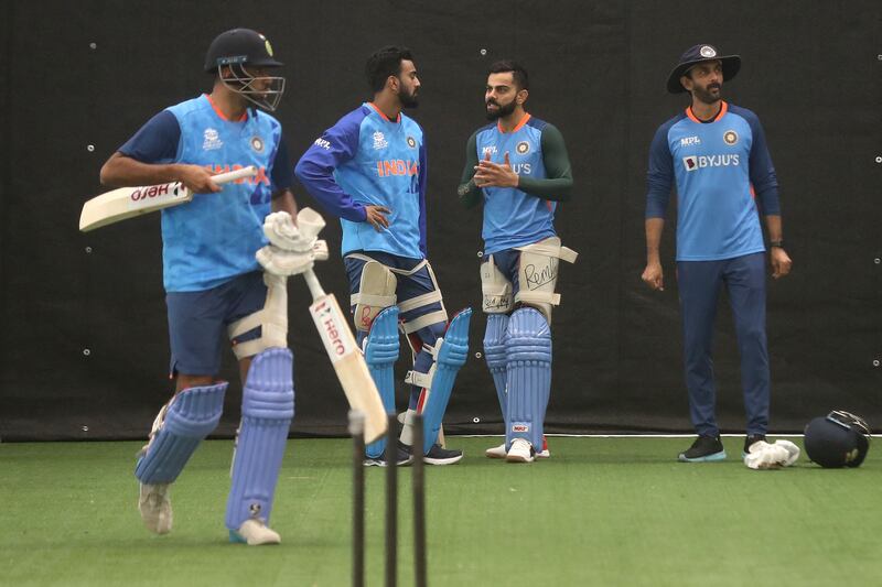 India's Virat Kohli, second right, during a nets session with teammates in Adelaide. AFP