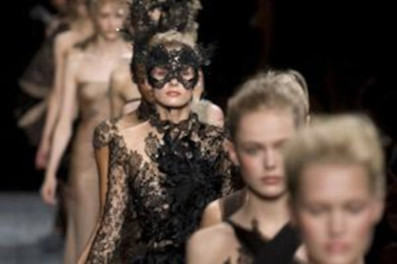 Models wear creations by Valentino at the recent haute couture autumn/winter collections in Paris.