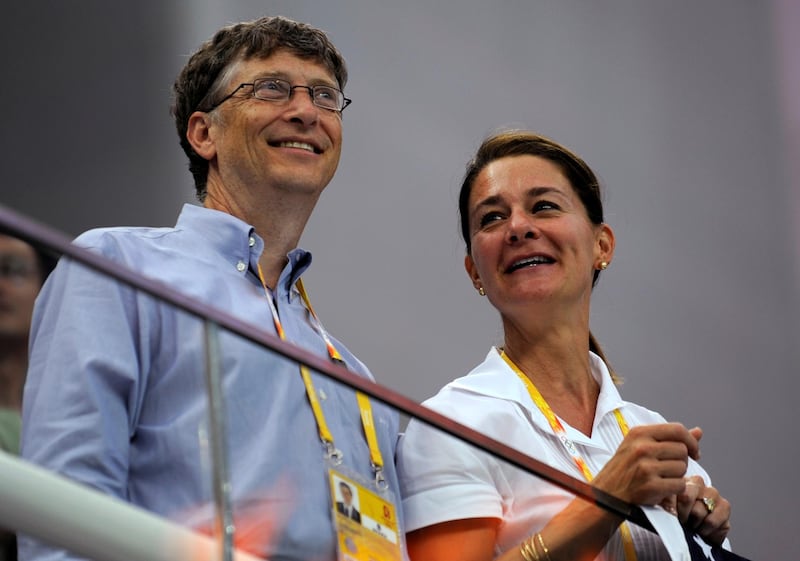 Microsoft Corp co-founder Bill Gates and his wife Melinda Gates watch the swimming events at the National Aquatics Center during the Beijing 2008 Olympic Games, in Beijing, China August 10, 2008. Reuters