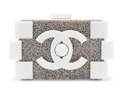 Lot 129 a , a white lucite and crystal Lego clutch by Chanel, with an estimate GBP2,000-3,000. Courtesy Christie's
