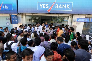 Indian depositors crowd for withdrawals outside a Yes Bank branch in Ahmedabad last week. AP
