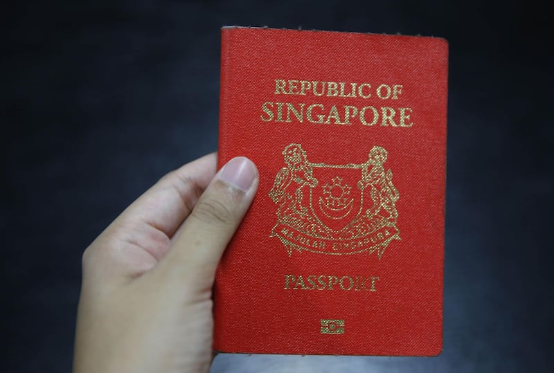 Mandatory Credit: Photo by Wallace Woon/EPA-EFE/Shutterstock (9177527d)
A Singapore passport is held up in Singapore, 28 October 2017. For the first time, Singapore is the single most powerful passport in the world. By removing visa requirements for Singaporeans, Paraguay helped Singapore edge out Germany for the top spot in a passport index developed by global financial advisory firm Arton Capital. Historically, the top ten most powerful passports in the world were mostly European, with Germany having the lead for the past two years.
Singapore edge out Germany for most powerful passport - 28 Oct 2017