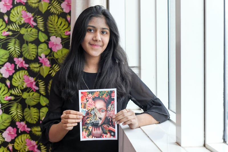 Abu Dhabi, United Arab Emirates - Jyoti Sharma, 13, from Abu Dhabi wins the COBIS Art Challenge 2021 with this painting displayed. Khushnum Bhandari for The National
