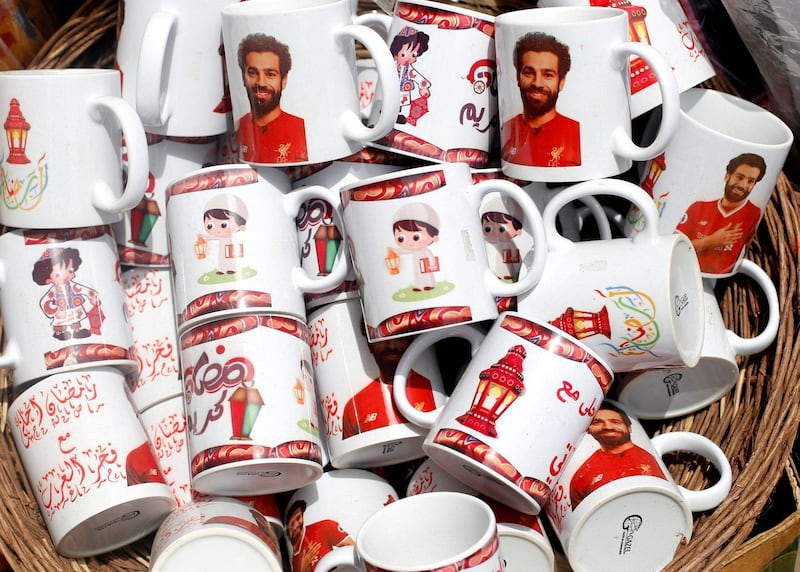 Decorative mugs bearing the image of Mohamed Salah are seen at a market, before the beginning of the holy fasting month of Ramadan in Cairo, Egypt. Amr Abdallah Dalsh / Reuters