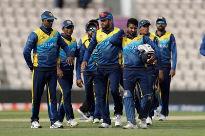 Sri Lanka walk off the field of play after they were defeated by 5 wickets in the Cricket World Cup warm-up match between Australia and Sri Lanka at the Hampshire Bowl in Southampton, England, Monday, May 27, 2019. (AP Photo/Matt Dunham)