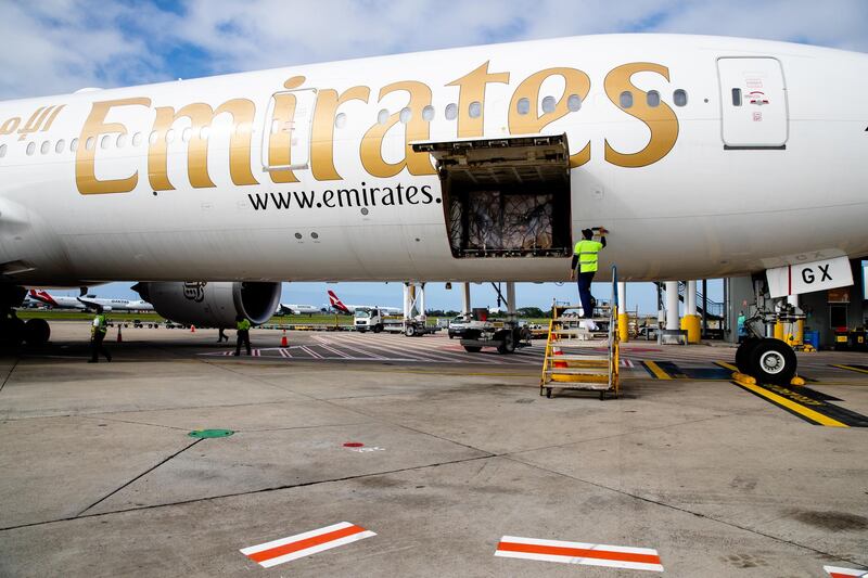 The doses are removed after arriving in Sydney. The Therapeutic Goods Administration will batch-test the shipment before the shots are administered. Getty