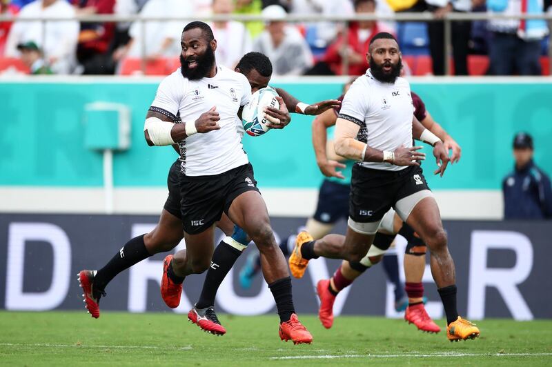 HIGASHIOSAKA, JAPAN - OCTOBER 03: Semi Radradra of Fiji runs with the ball on his way to scoring his team's fourth try during the Rugby World Cup 2019 Group D game between Georgia and Fiji at Hanazono Rugby Stadium on October 03, 2019 in Higashiosaka, Osaka, Japan. (Photo by Cameron Spencer/Getty Images)