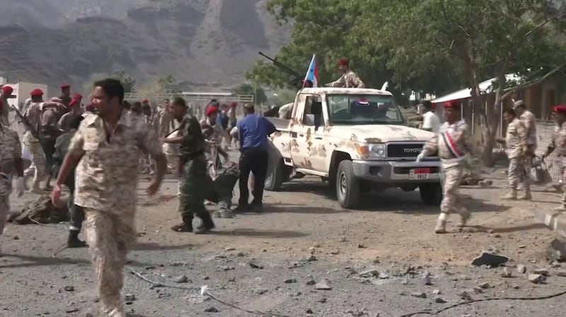 This AFPTV screen grab from a video, shows Yemeni security forcesy at the scene of a missile attack.  AFP