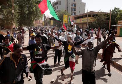 Anti-military protesters marching in Khartoum. AP