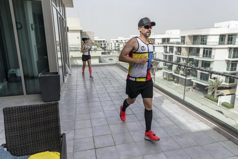 DUBAI, UNITED ARAB EMIRATES. 28 MARCH 2020. Colin and his wife Hilda are running a marathon on their balcony while the City of Dubai is under a Stay At Home policy to keep residence safe from the spread of Covid-19. (Photo: Antonie Robertson/The National) Journalist: Patrick Ryan. Section: Business.